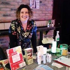 Promoting my services and products at on-site chair massage event!