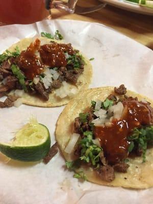 Carne asada tacos w/ the spicy salsa & I'm a spicy eaten person but this was fire!! It's a good thing, I like SPICY