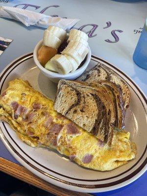 Ham and cheese omelette, rye toast, with a side of fruit!