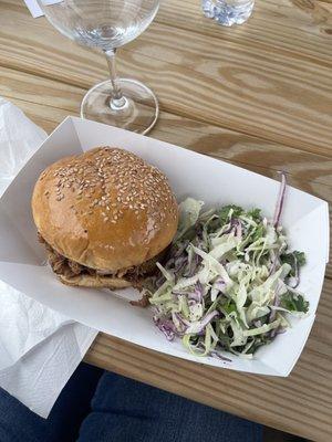 Barbecue pulled pork sandwich and coleslaw