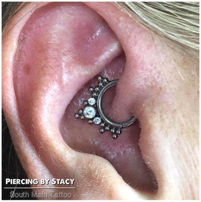 Daith piercing with beautiful jewelry from LeRoi Fine Body Jewelry