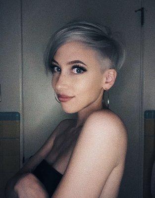 Pixie undercut, bleached and toned to silverish/white