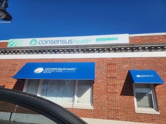 Med-Care's new sign/ name is Cons ensus Heath