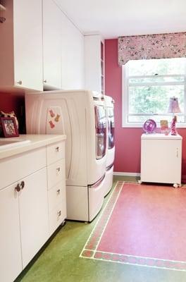 Fun laundry room with bordered Marmoleum flooring.