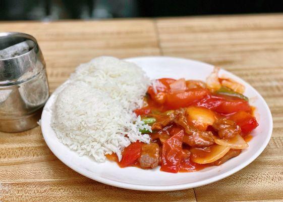 12. Tomato Beef over Rice $11.25