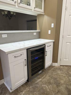 Wine fridge and cabinets