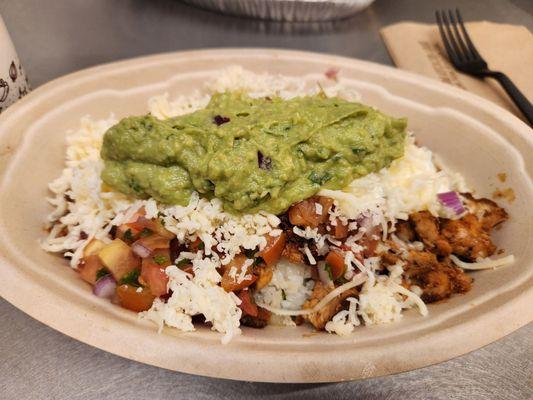 Chicken burrito bowl with guacamole