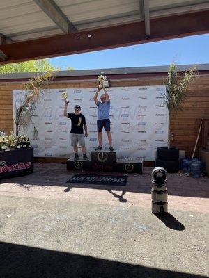 Trophy presentation in front of the trackside store