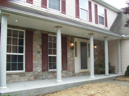 Porch column installation. Also installed recessed lighting on porch and new wall lights.