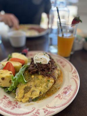 Fresh Squeezed Strawberry Oj Juice and Barbacoa Omelette with fresh Fruit Skewer