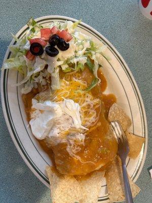 Wet burritos carnitas with green salsa flavor full and delicious