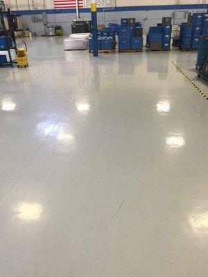 Scrubbing large warehouse floor