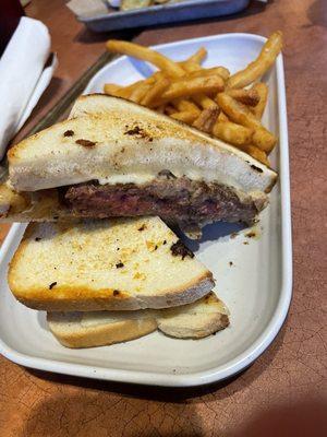 Mighty melt- toasted white bread, swiss cheese, american cheese, caramelized onions, burger sauce