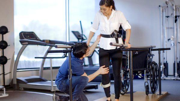 PTA students practice physical therapy techniques that help clients regain mobility.