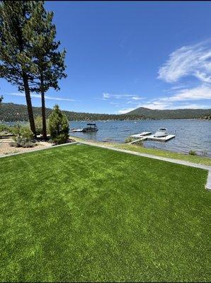 Enjoy a lush, maintenance-free landscape with premium turf by Havenhub, set perfectly against serene lakeside views. Enhance your outdoor!