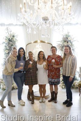 Ladies with cotton candy champagne while finding the perfect wedding dress :)