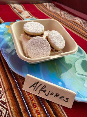 House Special Alfajores - Shortbread cookies, with dulce de leche in the middle. Topped with powder sugar.