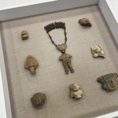 A custom shadowbox for a collection of Mesoamerican artifacts