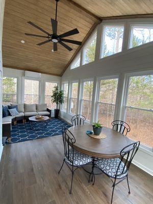 Finished sunroom - lots of windows. Includes mini-split system for heat and AC