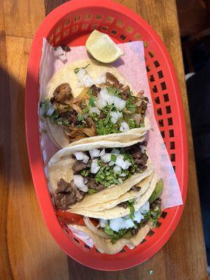 Carne asasa, steak fajita and Al pastor tacos