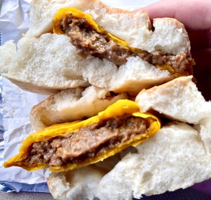 I tore the mild beef patty wrapped in cocoa bread in half to show the soft bread and delicious lightly spicy beef pie filling