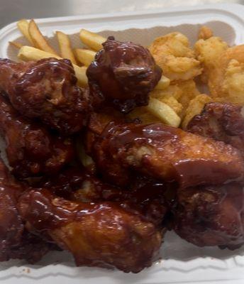 Barbecue chicken wings and fries