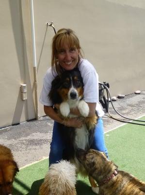 Heidi, Dog Dayz Manager gets her love time with the dogs