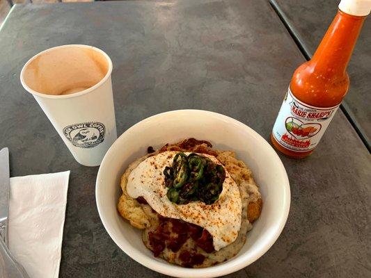 An entire day's worth of calories! - the crispy jalapeno's on top are an amazing accent to the bacon gravy over biscuits and hash browns.