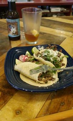 The "streat tacos" with a cerveza.