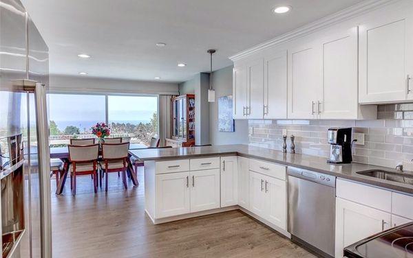 Shaker cabinet install with quartz top, mosaic glass backsplash