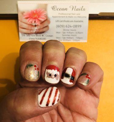 What a beautiful job on my nails! Just love the little Santa. Love this place!