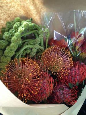 Protea, amaranthus, and freesia....