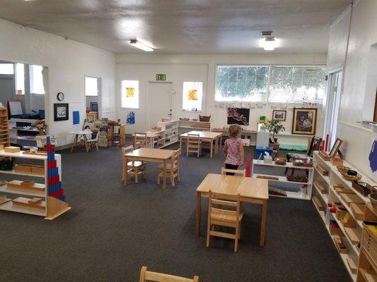 Beautiful wooden Montessori materials in a peaceful, structured environment