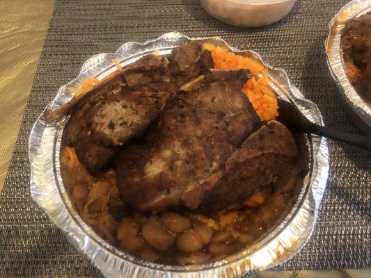 Pork chops with yellow rice and beans. Really good!