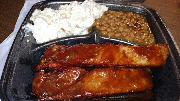 1/4 rack of ribs with potato salad and baked beans, $13