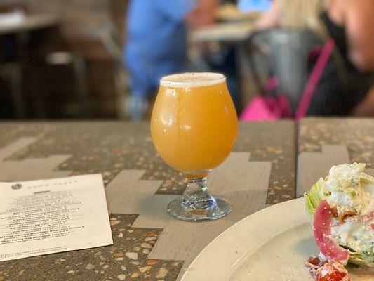 Hazy IPA and part of a wedge salad.