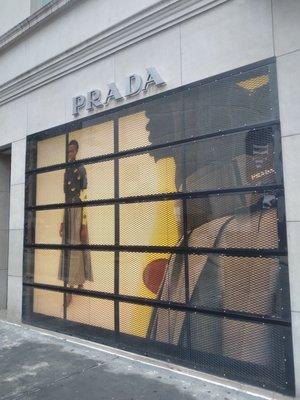 Prada frontage gated like a prison 2021