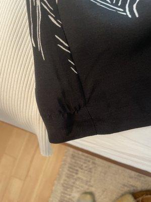 Stitching that I did not ask for...and has ruined my dress.