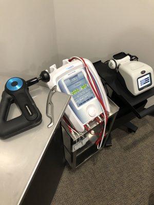 A few of our therapeutic modalities; Theragun G3Pro, IASTM, E-stim and Class IV Deep Tissue Laser