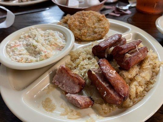 Sausage and sauerkraut, slaw, fried green tomatoes.