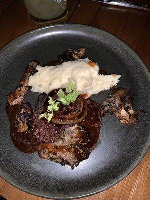 Filet Mignon with a side of sautéed mushrooms and garlic mashed potatoes