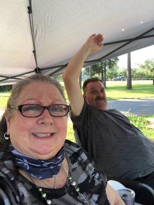 My Husband, Ernie and I working the polls. It's going to be a long day. I am praying the rain holds off.