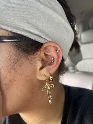 Snake bit conch piercing. I thought I was going to get a daith, but did not have the anatomy for it, and Lola helped me get to THIS :))