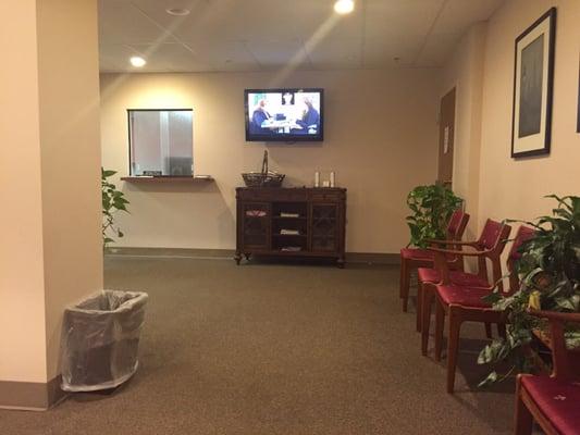 Nice waiting room with baskets of samples of All detergent and fabric softener, Aveeno lotion, Dove soap and coupons!