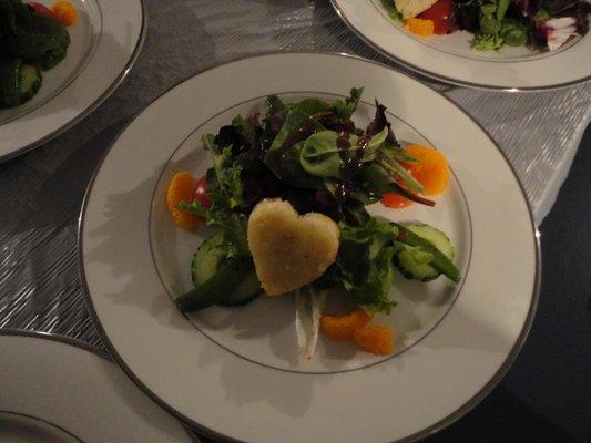 Field Greens with sautéed snap peas, seedless English cucumber, citrus and a warm brie crouton