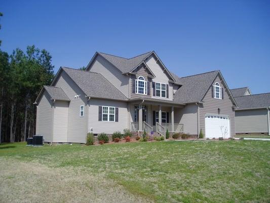 This Clayton home features new 5" seamless aluminum gutters and large, 3"x4" aluminum downspouts