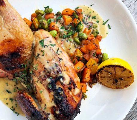 Our smoked half chicken and sweet potato hash with lemon thyme gravy.