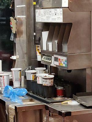 Drink pouring machine at the drive thru window.