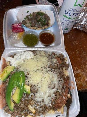 Asada fries and lengua taco