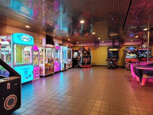 Arcade area. You need to use a card to play. Most games are $1 per play. A few of the games were out of service.